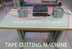 TAPE CUTTING MACHINE